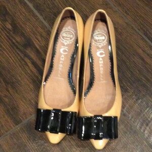 Tan kitten heel bow shoe by Jeffrey Campbell
